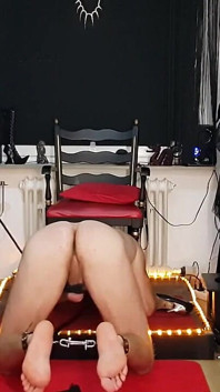Dominant Brunette Mistress Torments Her Submissive Slave