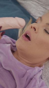 Blindfolded Blonde Pleasures Herself with Dildo and Fingers