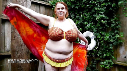 Kore Goddess: Redhead BBW sucks his cock in the pool in outdoor...