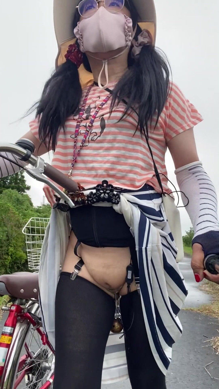 megu2002: No. 254: Cycling Along the Riverbank