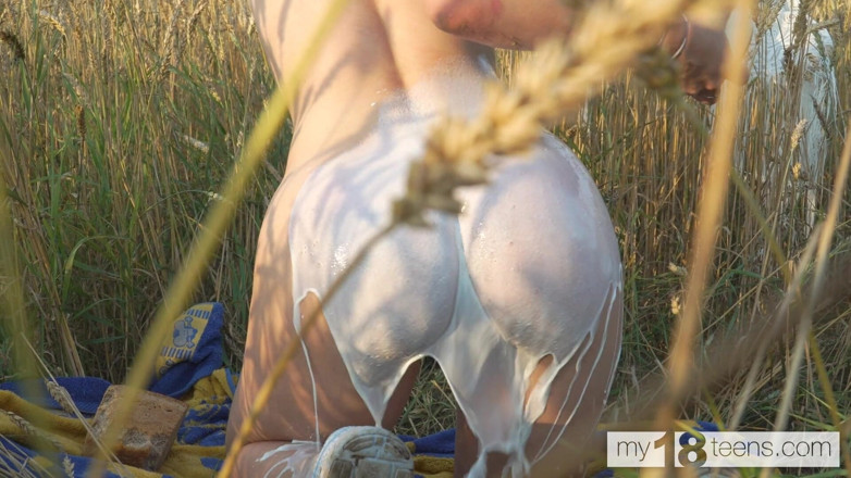My 18 Teens: Sexy farm girl masturbates in the field after a hard...
