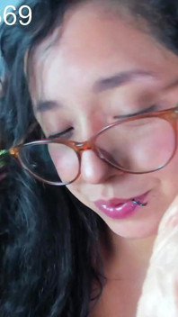 I Seduce the Camera While Sucking on My Favorite Dildo