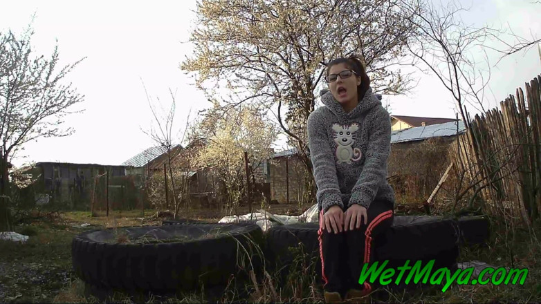 Wet Maya: Peeing on some old tires in the yard