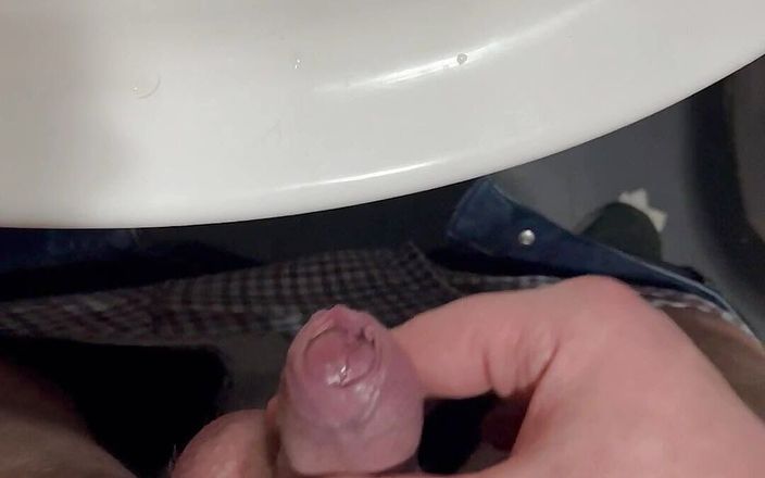 Young cum: A young guy masturbates his dick and cums in a...