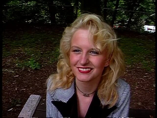 Lucky Cooch: Classy blonde giving an outdoor interview