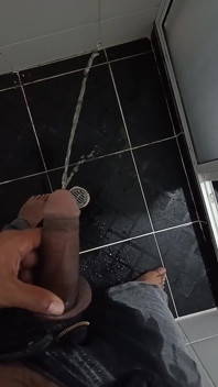 Urinating in Dark Jeans