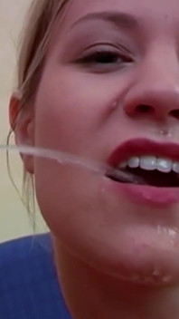 Blonde teen gets her mouth full of cum and piss