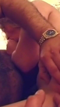 Curly Haired MILF Devours Throbbing Cock in Sloppy Blowjob Frenzy