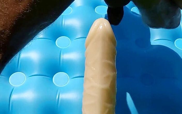 Latex Toys: Riding on a monster cock