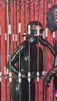 Imprisoned Rubber Slut Has to Give a Blowjob