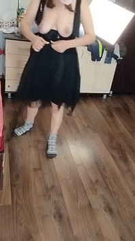 Amateur Woman Has Fun Trying on Clothes and Cutting Them.