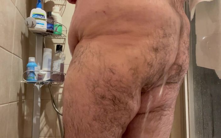 Masked chaser and bear: Bear Shoves Dildo up His Ass Before Showering