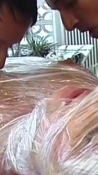 Plastic Wrapped Mature Slut Licked and Facesat by Horny Couple