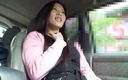 Asiatiques: Brunette hottie masturbating with vibrator in car