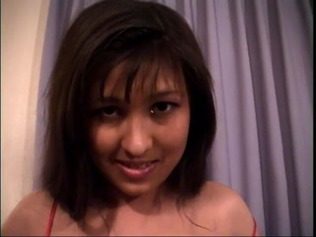Cumming Soon: Exotic beauty lies on the couch with sexy red lingerie...