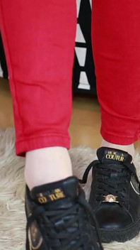 Red Jeans and Black Sneakers
