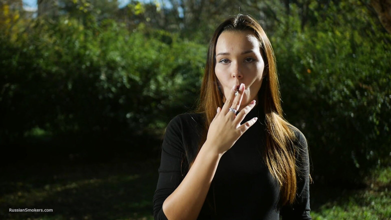 Russian Smokers: Sweet Sensual Russian Girl Smoking Cigarette Outside
