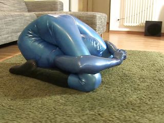 Fem Latex: She enjoys the tight horny feeling of rubber during flexible...