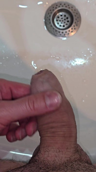 Pissing to the Bathroom Sink