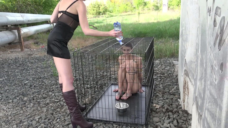 Femdom Austria: Exposed in the public pillory cage!