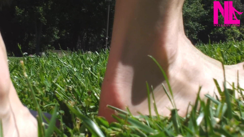 Nyllady: Nyllady Walking Barefoot on Th Grass in a Park