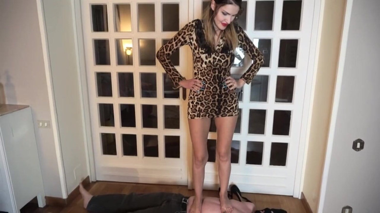 Lady Mesmeratrix Official: Femdom chick walking on slaves body