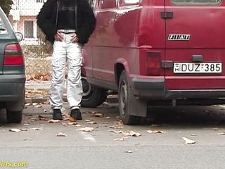 Crazy pee girls: Girl peeing between the cars