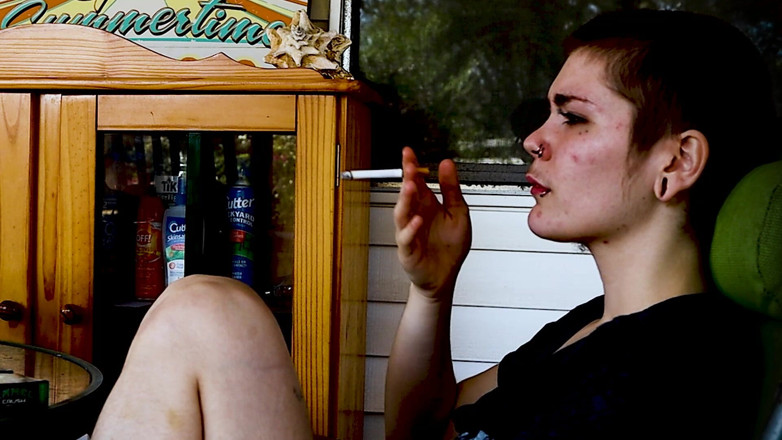 Vibra King Video: Shaved Head Goth Smokes Outside
