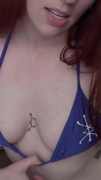 Tattooed Redhead Bikini Tease