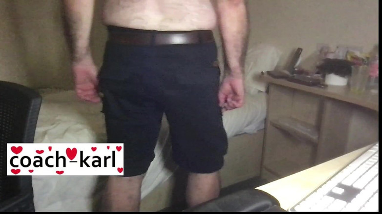 Coach Karl dude lodge: Coach Karl shows off his blue shorts