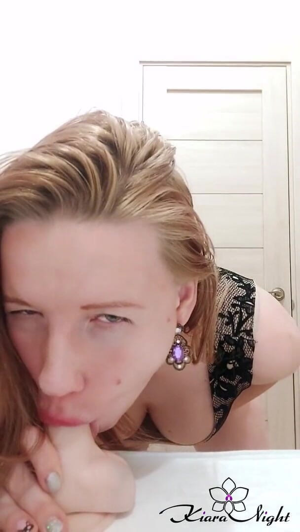 Kiara Night: MILF in dress sucks dildo and caresses wet pussy in...