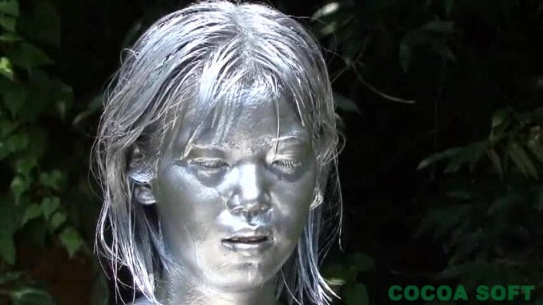 Cocoa Soft: It gave a silver body paint video shot outside