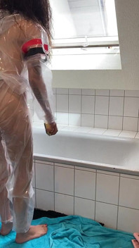 Sue, Cleaning the Bathroom in a Pvc Suit!