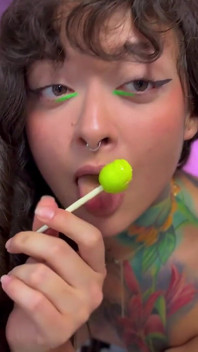 Girl with Split Tongue Farts on Lollipop and Eats It