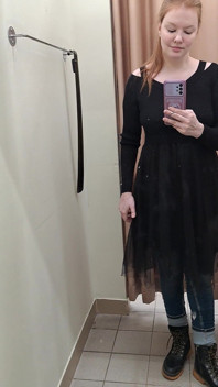 What Words Pop Into Your Head When You Look at the Red-haired Mistress in the Black Dress?