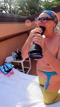 Fucked on the Terrace with a Giant Dildo