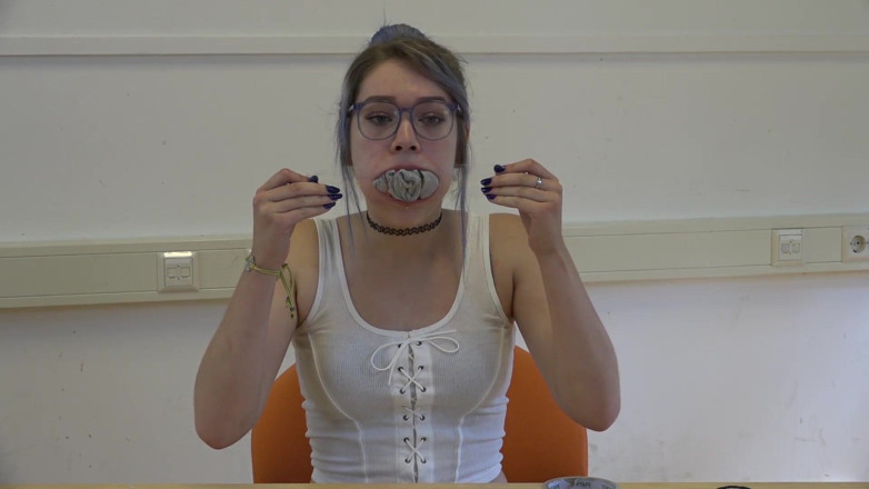 Restricting Ropes: Gagging herself with socks up close