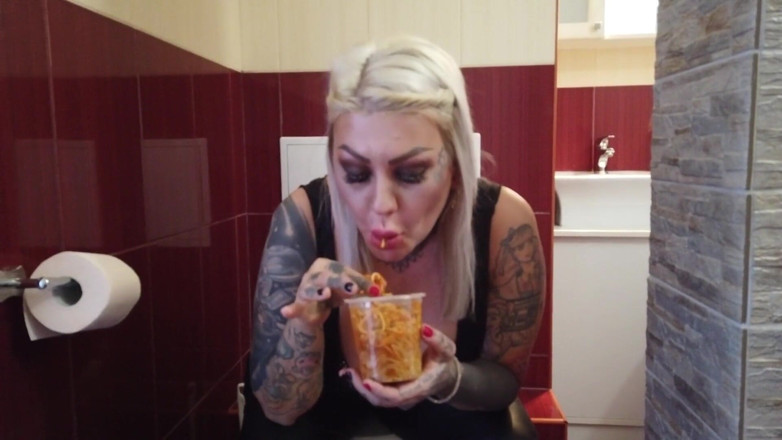 Fetish videos by Alex: Blonde Tattooed MILF Eats Spaghetti on the Toilet