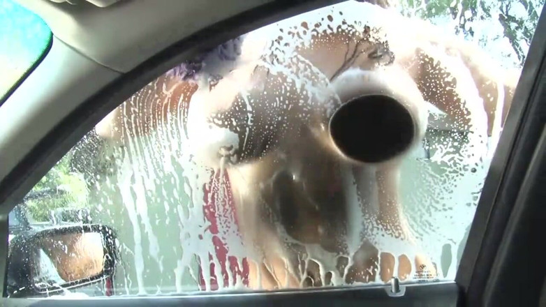Big Tits World: Sexy and wet girl washing car gives a good boobjob