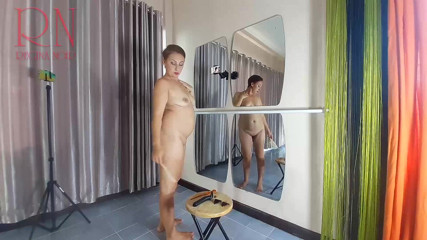 Regina Noir: Naked nudist hairdresser. She cuts her own hair. Regina Noir...