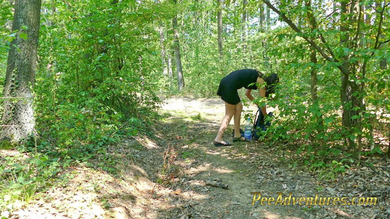 Pee Adventures: Sexy brunette stripping naked and pissing outdoor