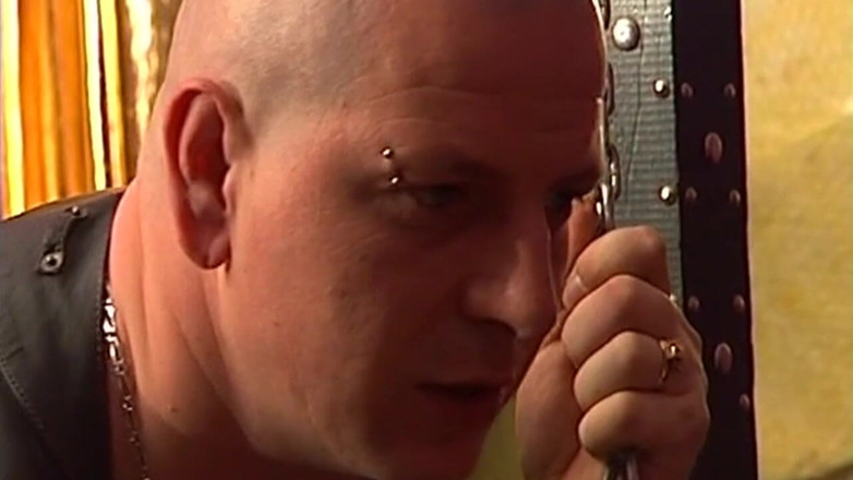THAGSON ONLY: Tattooed Dom Fists Mature Blonde in Chains