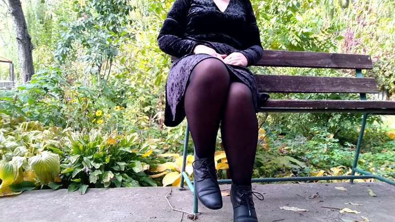 Elena: Peeing with legs spread wide on a bench in an...