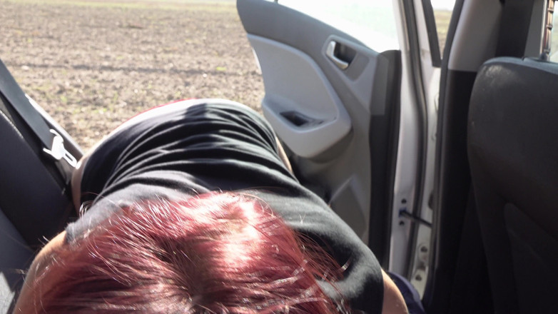 My German Amateurs: Redhead chick sucks big pecker in the car