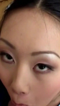 An Asian Female Engages in Self-stimulation While Anticipating Engaging in Intense Anal Intercourse in the Doggie Style Posture.