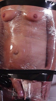 Slave in Plastic Wrap Bondage Gets a Cruel CBT