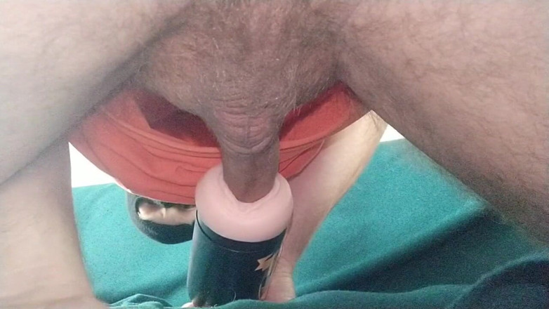 Hot guy solo: close up flashlight fuck