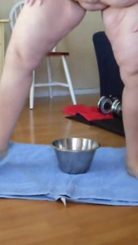 Jen Is Pissing Into a Steel Bowl