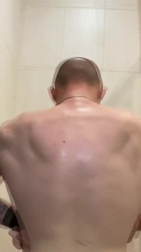 Alpha Shows off His Back Muscles