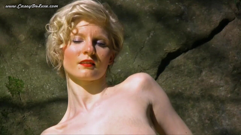 Casey Deluxe: Casey exposing her big tits in the sun